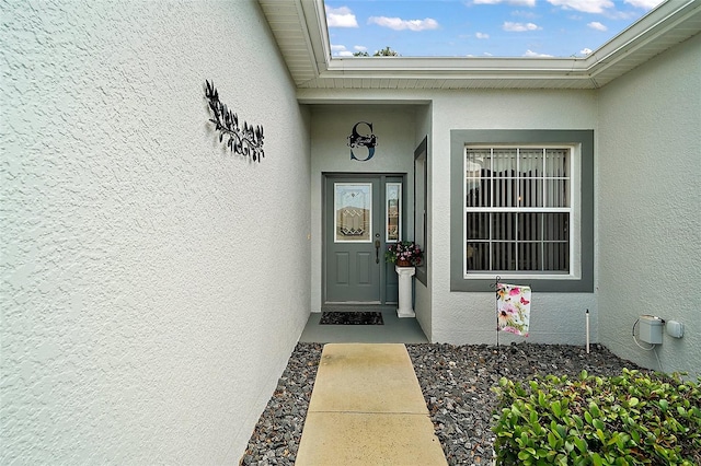 3800 Woodleaf Ct, Leesburg, FL 34748 - doorway to property featuring stucco siding