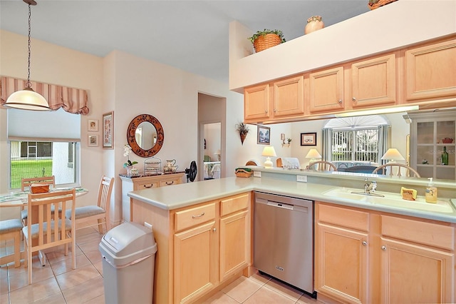 3800 Woodleaf Ct, Leesburg, FL 34748 - kitchen with dishwasher, light brown cabinetry, light tile patterned floors, and light countertops