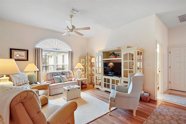 3800 Woodleaf Ct, Leesburg, FL 34748 - living room featuring a ceiling fan and light wood-style floors