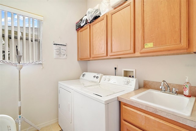 3800 Woodleaf Ct, Leesburg, FL 34748 - washroom featuring washing machine and clothes dryer, cabinet space, and baseboards