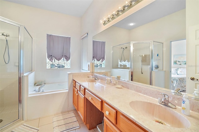 3800 Woodleaf Ct, Leesburg, FL 34748 - full bath featuring a stall shower, a bath, double vanity, and tile patterned flooring