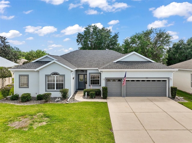 3800 Woodleaf Ct, Leesburg, FL 34748 - single story home with an attached garage, a front lawn, driveway, and stucco siding