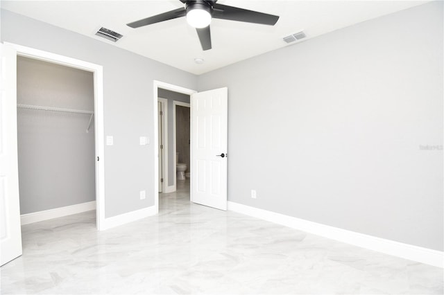 unfurnished bedroom with visible vents, baseboards, and a closet