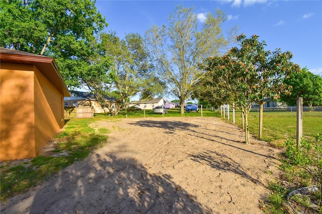 view of yard with fence