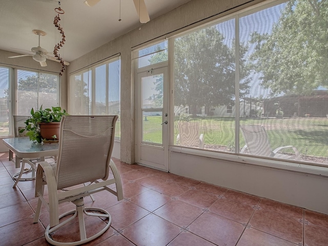 910 Eagles Lndg, Leesburg, FL 34748 - sunroom featuring healthy amount of natural light and tile patterned floors