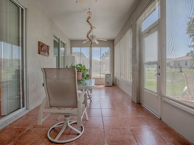 910 Eagles Lndg, Leesburg, FL 34748 - sunroom featuring a ceiling fan