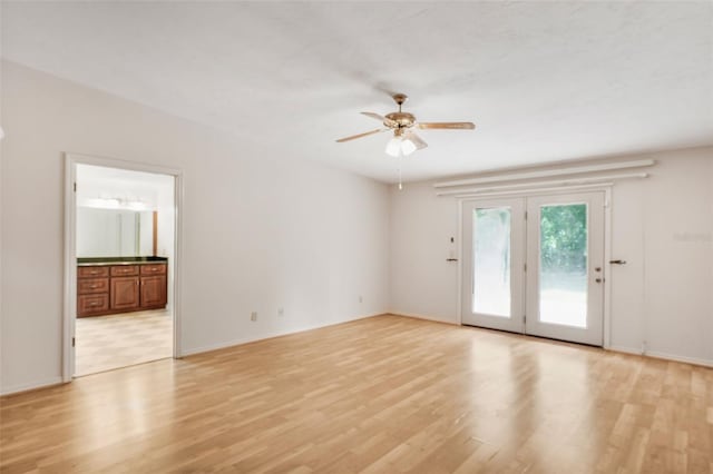 8640 E Henderson Trl, Inverness, FL 34450 - spare room with baseboards, a ceiling fan, and light wood finished floors