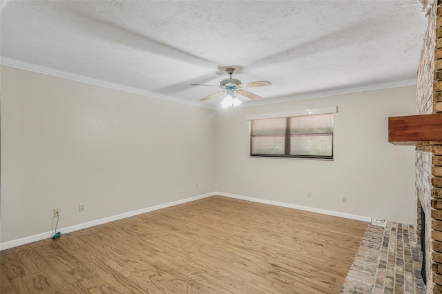 8640 E Henderson Trl, Inverness, FL 34450 - spare room featuring wood finished floors, ornamental molding, baseboards, a textured ceiling, and ceiling fan