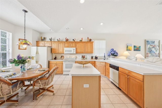 kitchen with white appliances, a peninsula, light tile patterned flooring, light countertops, and a sink