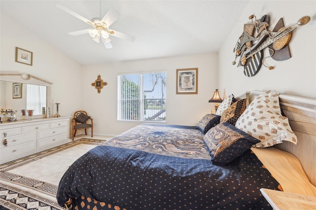 bedroom with baseboards, vaulted ceiling, and ceiling fan