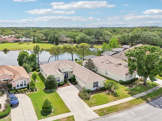 bird's eye view featuring a water view and a residential view