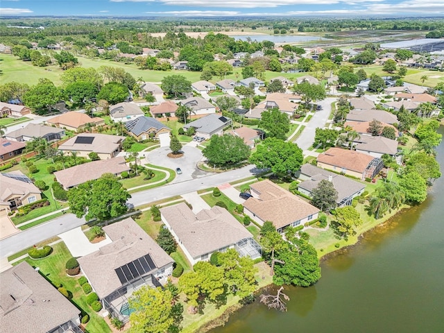 aerial view featuring a water view and a residential view