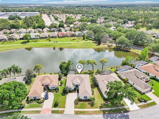 bird's eye view with a water view and a residential view