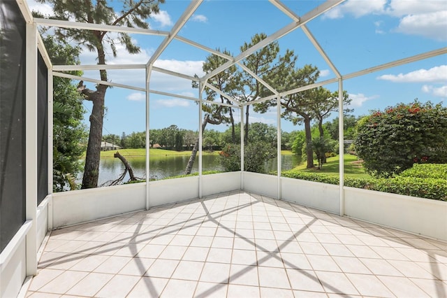 8043 Pine Hollow Dr, Mount Dora, FL 32757 - unfurnished sunroom featuring a water view and view of scattered trees