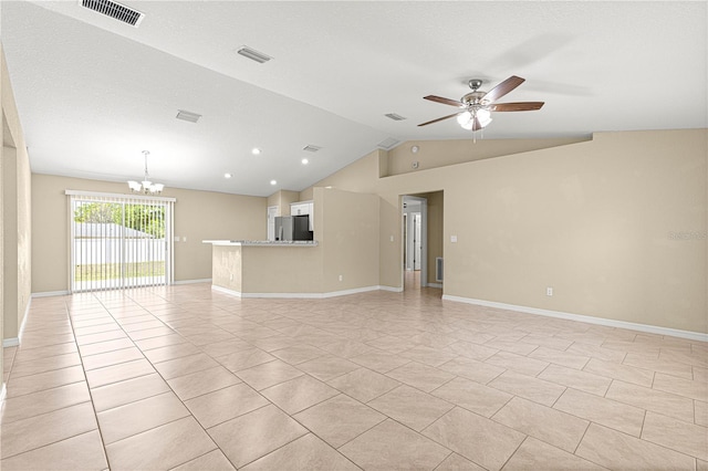 unfurnished living room with baseboards, visible vents, vaulted ceiling, and ceiling fan with notable chandelier