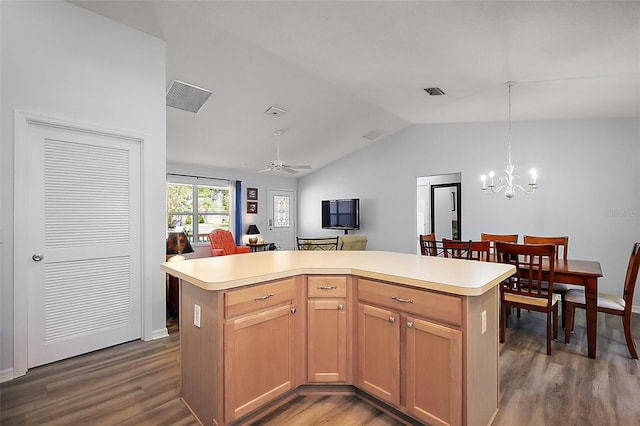2290 Due W Dr, The Villages, FL 32162 - kitchen featuring lofted ceiling, light countertops, visible vents, dark wood finished floors, and pendant lighting