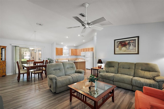 2290 Due W Dr, The Villages, FL 32162 - living area featuring visible vents, ceiling fan with notable chandelier, wood finished floors, and vaulted ceiling
