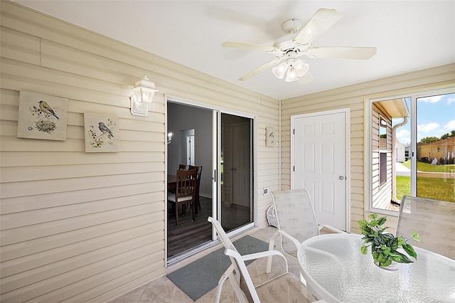 2290 Due W Dr, The Villages, FL 32162 - sunroom featuring outdoor dining area and ceiling fan