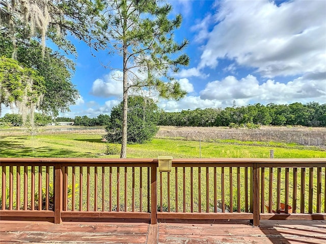 deck featuring a lawn