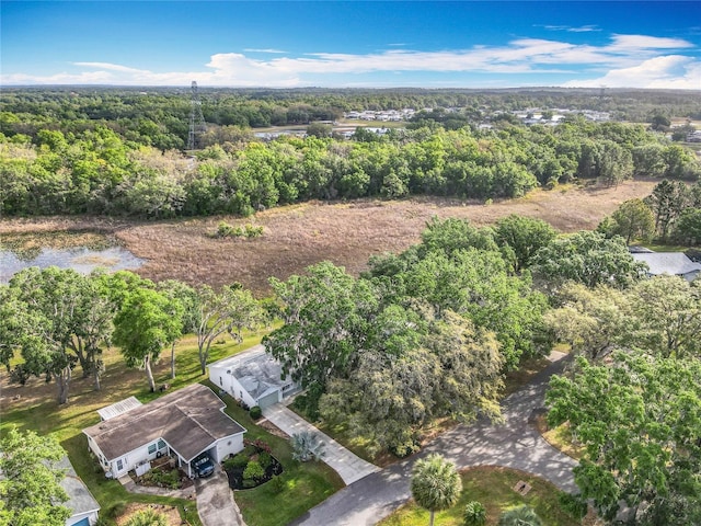 aerial view with a wooded view