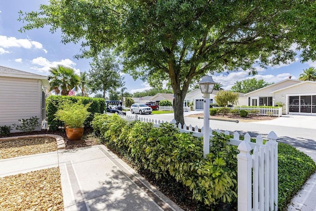1667 Osprey Ave, The Villages, FL 32162 - view of yard with a residential view and a fenced front yard