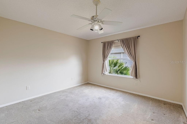 1667 Osprey Ave, The Villages, FL 32162 - empty room featuring ceiling fan, carpet, and a textured ceiling