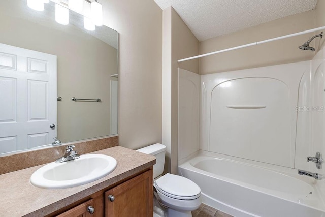 1667 Osprey Ave, The Villages, FL 32162 - bathroom featuring a textured ceiling, toilet, vanity, and shower / washtub combination