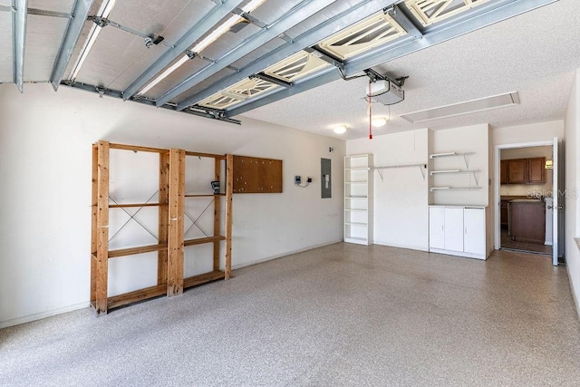 1667 Osprey Ave, The Villages, FL 32162 - garage with a garage door opener and electric panel