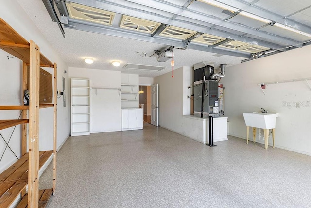 1667 Osprey Ave, The Villages, FL 32162 - garage featuring heating unit and a garage door opener