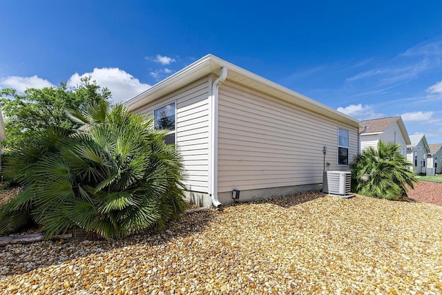 1667 Osprey Ave, The Villages, FL 32162 - view of property exterior with central air condition unit