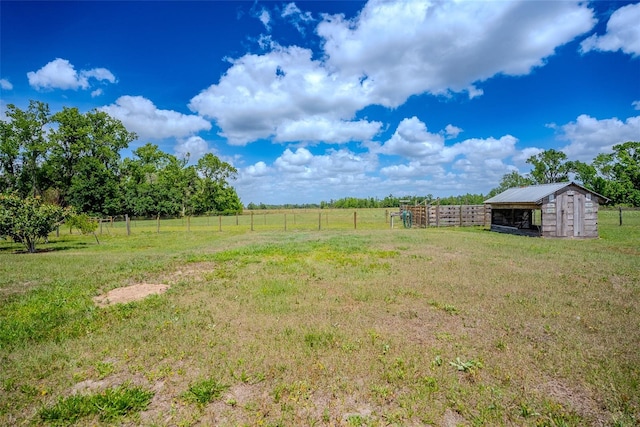 15141 Farm Rd, Groveland, FL 34736 - view of yard with an outbuilding, fence, and a rural view
