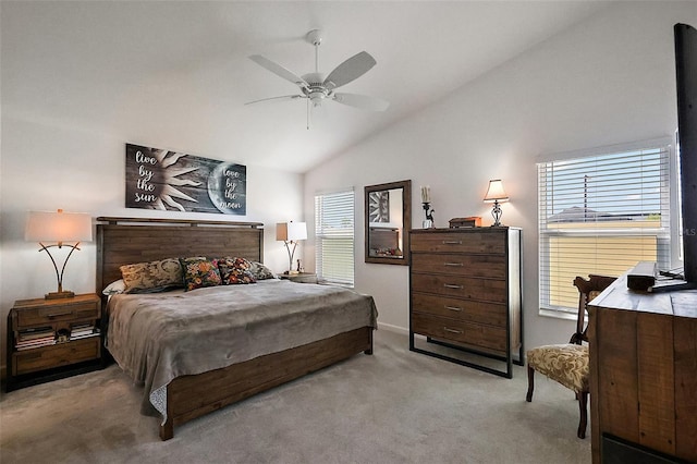 bedroom featuring ceiling fan, lofted ceiling, and carpet floors