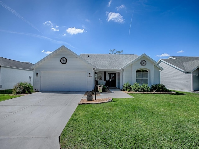 1010 Ventura Dr, The Villages, FL 32159 - ranch-style house featuring driveway, a garage, and a front lawn