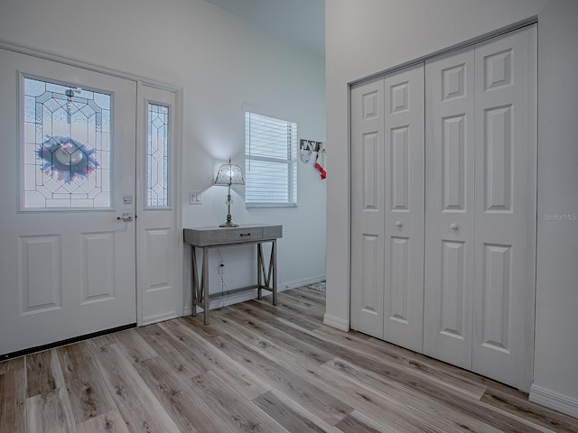 1010 Ventura Dr, The Villages, FL 32159 - entrance foyer with baseboards and light wood finished floors