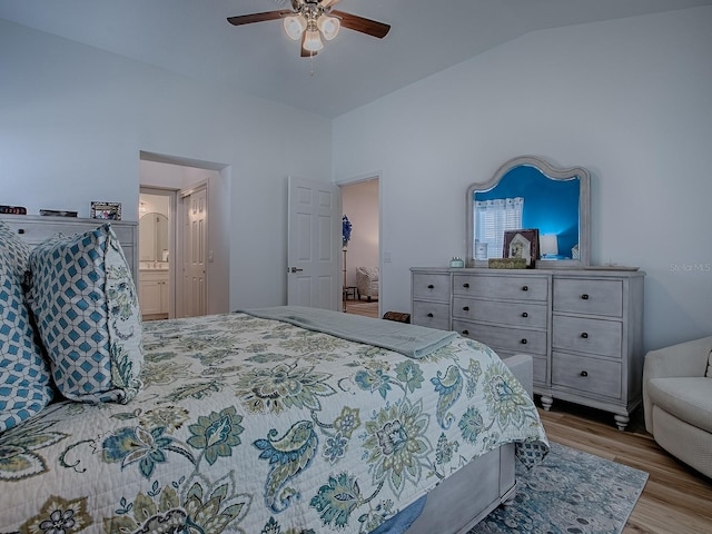 1010 Ventura Dr, The Villages, FL 32159 - bedroom featuring lofted ceiling, ceiling fan, connected bathroom, and wood finished floors