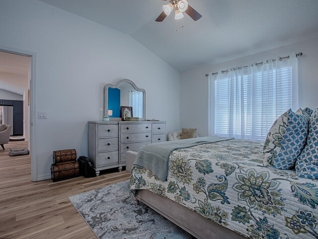 1010 Ventura Dr, The Villages, FL 32159 - bedroom featuring wood finished floors, a ceiling fan, and lofted ceiling