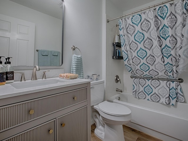 1010 Ventura Dr, The Villages, FL 32159 - bathroom with toilet, vanity, wood finished floors, and shower / bath combination with curtain