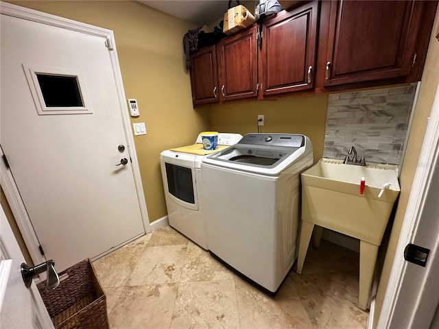 3511 Fox Lake Dr, Apopka, FL 32712 - laundry room featuring washer and clothes dryer and cabinet space