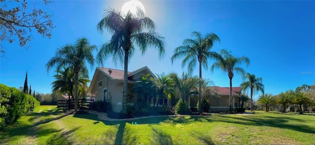 3511 Fox Lake Dr, Apopka, FL 32712 - view of home's exterior with a yard and stucco siding
