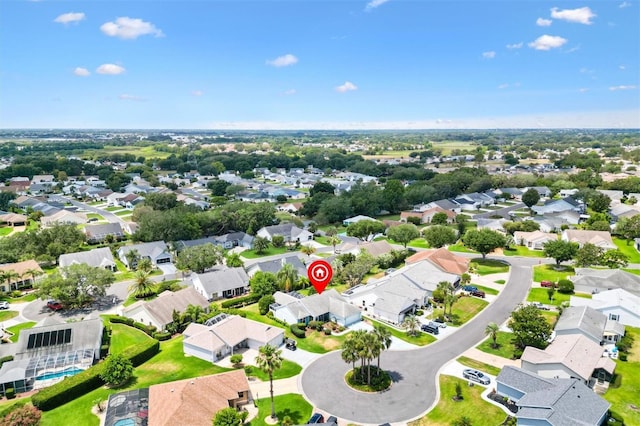 aerial perspective of suburban area with a pool area