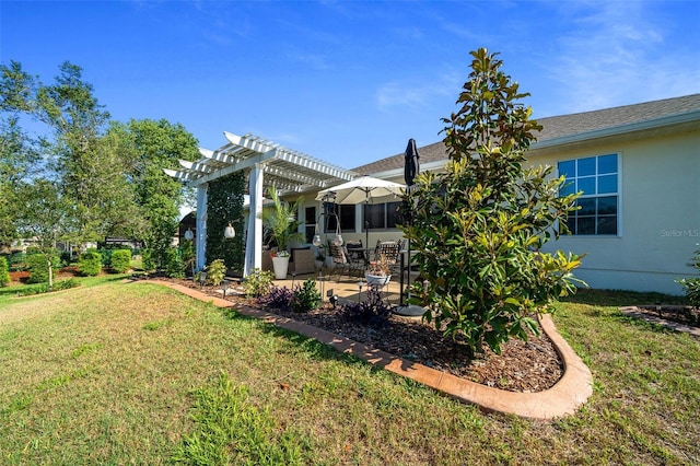 view of yard featuring a pergola and a patio area