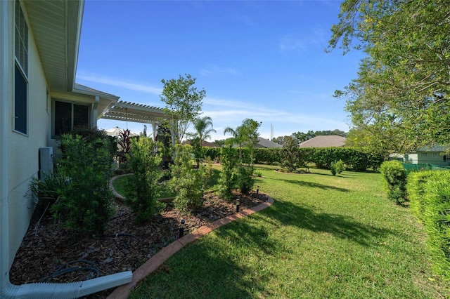 view of yard with a pergola