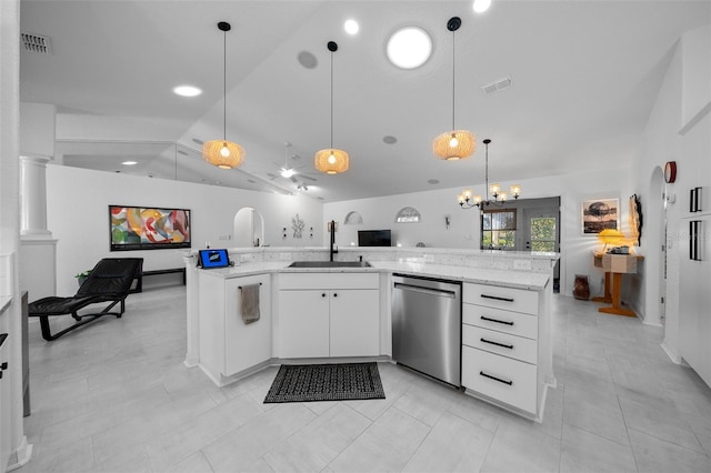11860 SE 179th St, Summerfield, FL 34491 - kitchen with dishwasher, a sink, vaulted ceiling, open floor plan, and light stone counters