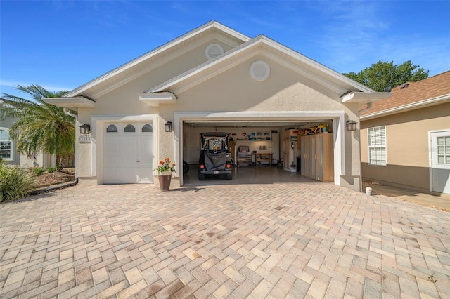 11860 SE 179th St, Summerfield, FL 34491 - garage featuring decorative driveway