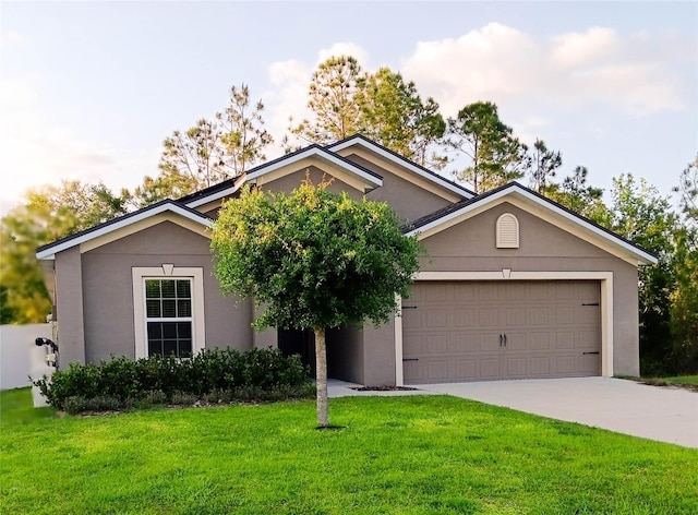 27 Perch Dr, Kissimmee, FL 34759 - view of front of home featuring stucco siding, concrete driveway, a front yard, and a garage