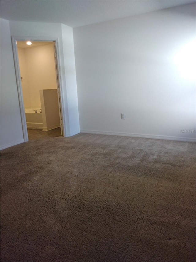 27 Perch Dr, Kissimmee, FL 34759 - carpeted spare room with baseboards