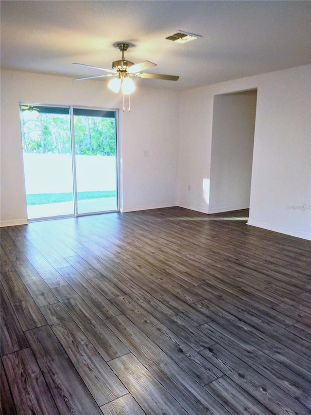 27 Perch Dr, Kissimmee, FL 34759 - empty room with ceiling fan, dark wood-style floors, and baseboards