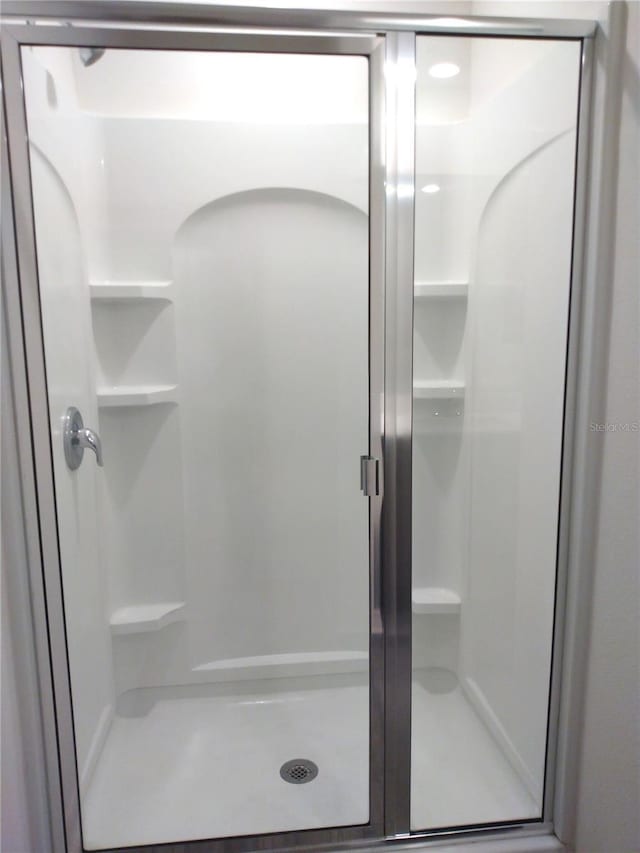 27 Perch Dr, Kissimmee, FL 34759 - full bathroom featuring a stall shower