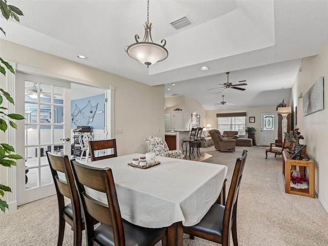 1307 Galindo Pl, The Villages, FL 32159 - dining space featuring visible vents, ceiling fan, recessed lighting, and a tray ceiling