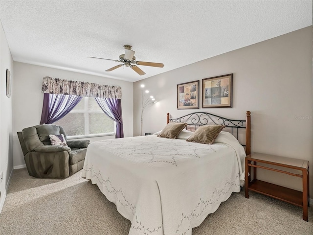 1307 Galindo Pl, The Villages, FL 32159 - carpeted bedroom with a textured ceiling and a ceiling fan